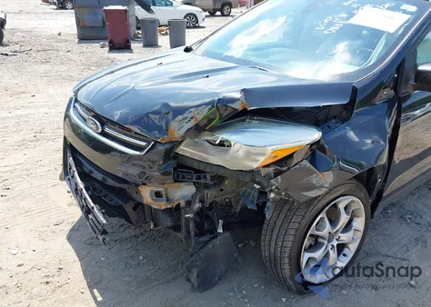 2014 Ford Escape Titanium z USA, uszkodzony, nr VIN 1FMCU0J94EUD77831